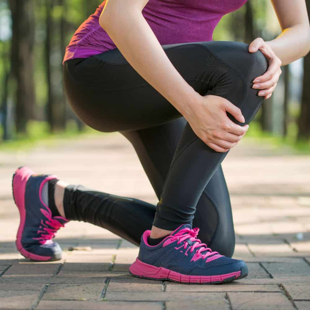 Woman in Fairfax VA running with knee pain