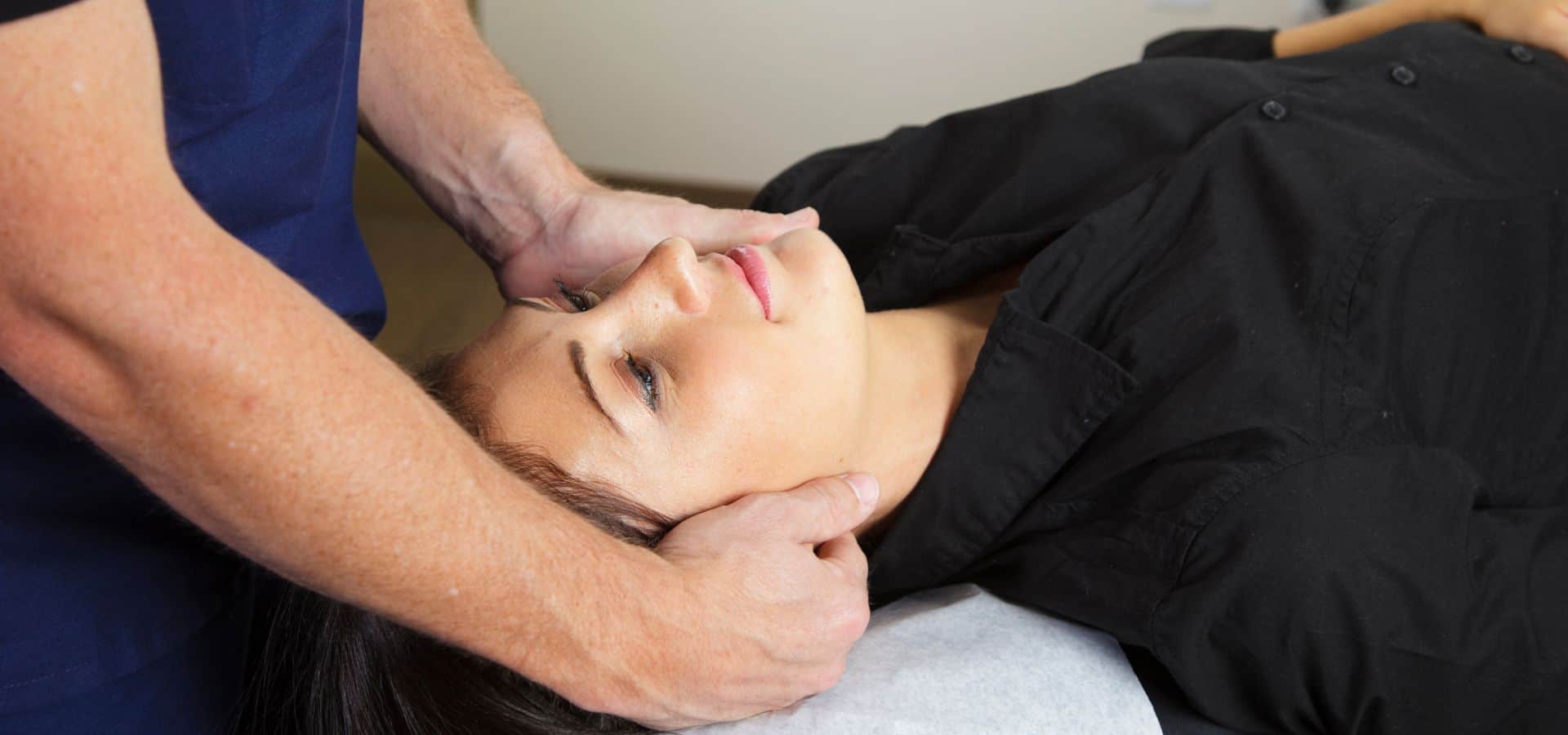 Rockville Car Accident Chiropractor Woman receiving chiropractic adjustments in Rockville after a car accident.