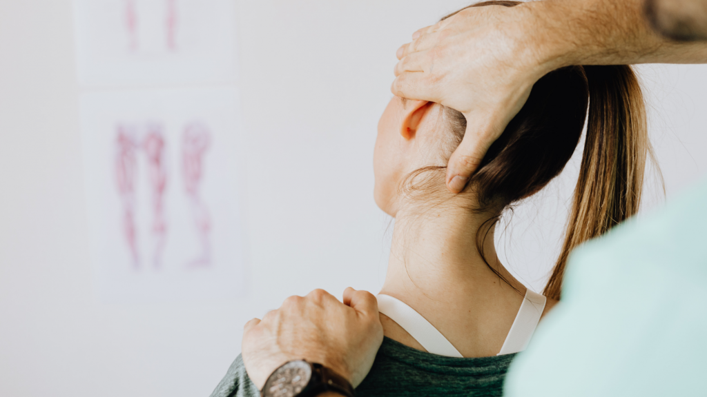 prenatal woman using chiropractic adjustments to relieve pain during pregnancy