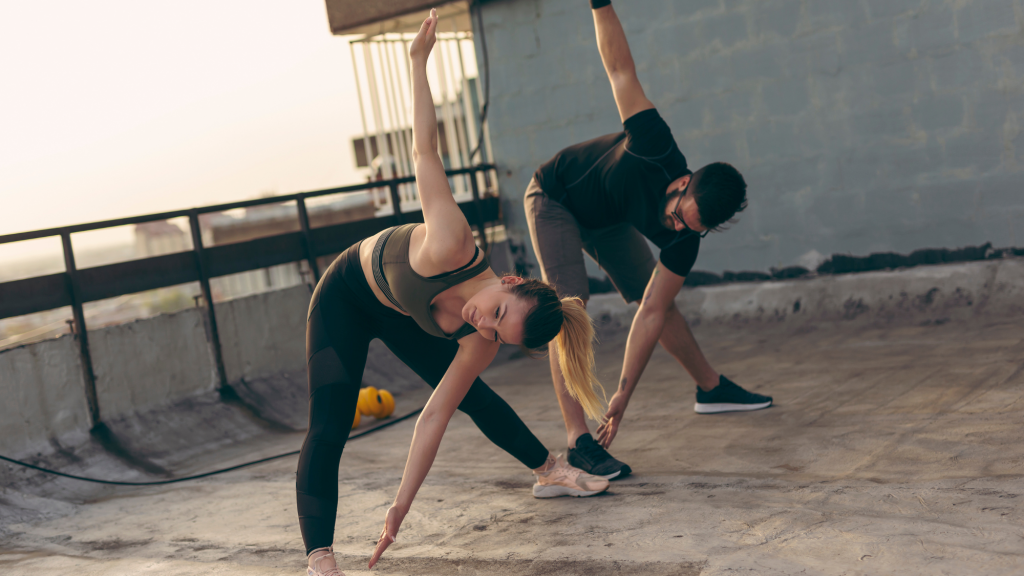 two people doing mobility exercises after reading kaizo healths fitness hack post