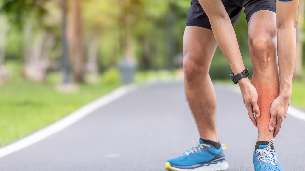 man who needs dry needling at chiropractor for his shin splints while running