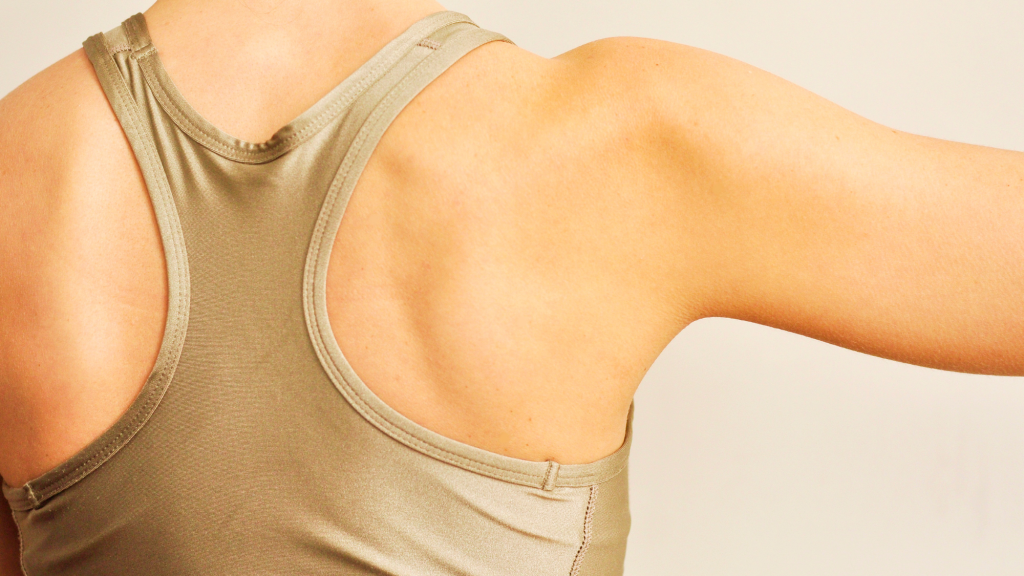 woman's back of right shoulder