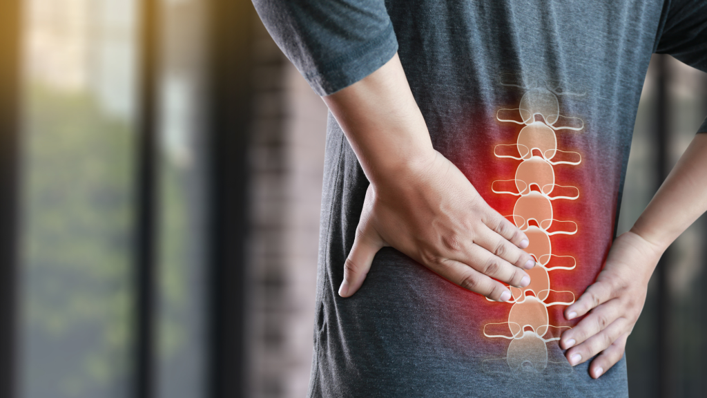 picture of man holding back with back pain 