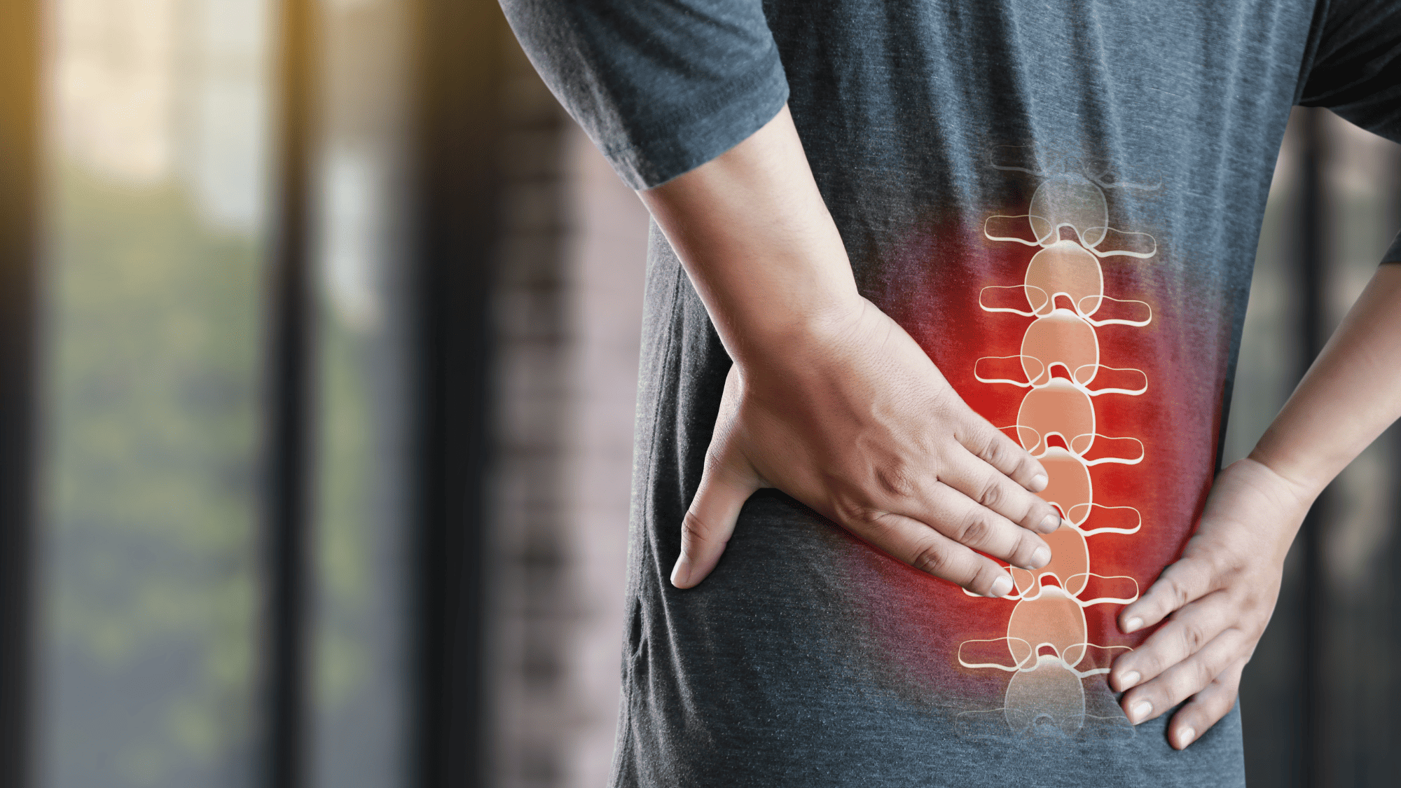 picture of man holding back with back pain